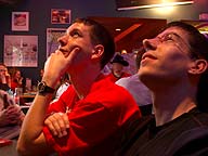 Andrew and Mike watch the game at a Boston Pizza on 17th and 10th.