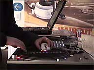 Video still: Scratching a 1200 with a mouse and SoundCraft software (2.9 MB DivX 5 video, 1:34)